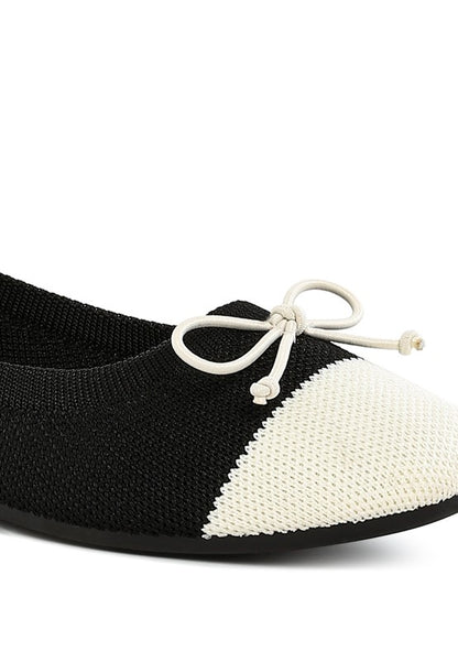 Close up of Rosario Two Tone Ballerinas in black and white showing cap toe design