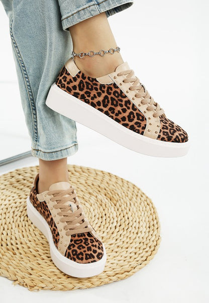 Front view of beige leopard print studded chunky sneakers with lace-up closure and flatform sole.