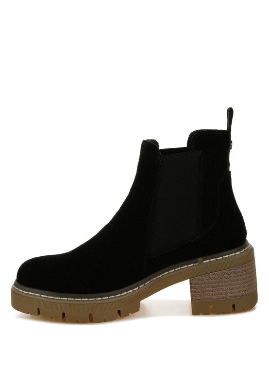Black Chelsea boots with elastic gusset and stacked low-block heel