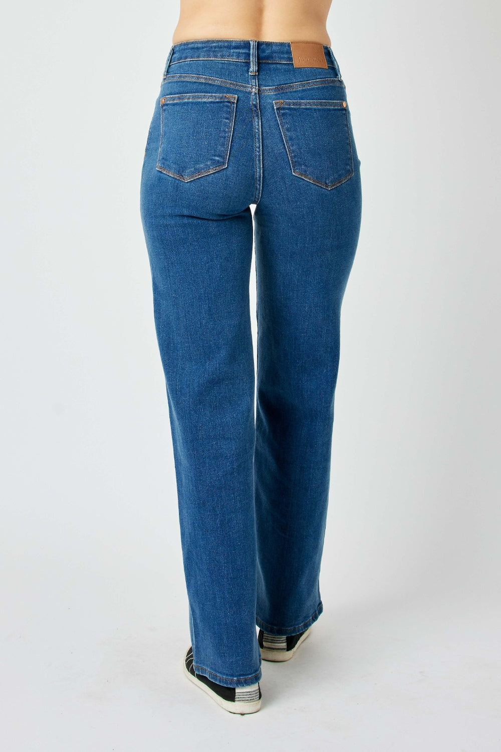 Judy Blue high-rise straight leg jeans in a medium wash with moderate stretch.