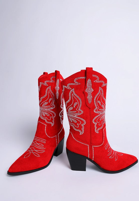 Pair of red cowboy boots standing upright with rhinestone details
