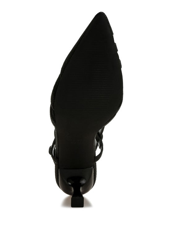 Bottom sole of Black Daldra Kitten Heel Slingback Sandals with textured grip and low heel
