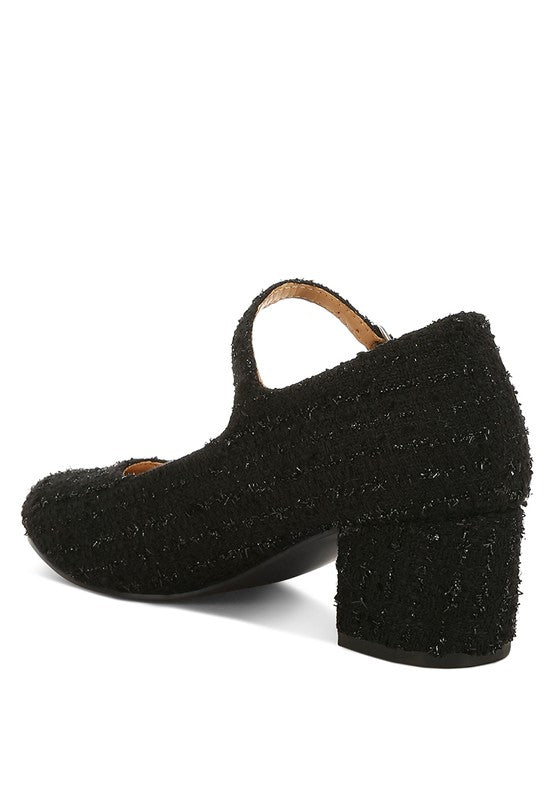 Back angle of Black Antara Tweed Mary Jane Heels highlighting block heel and ankle strap closure.