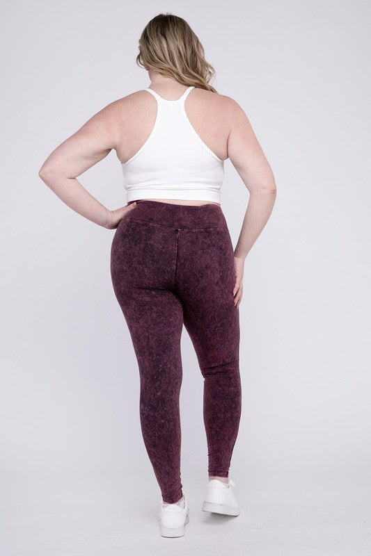 Stretchy dark burgandy colored, mineral washed, full-length leggings with a wide waistband.