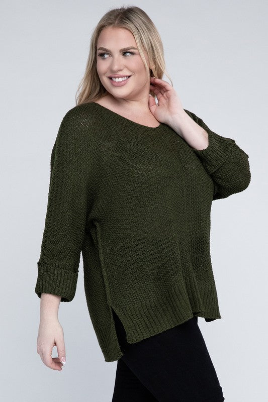 Olive green plus size crew neck sweater with a loose fit, long sleeves, and a cozy knit fabric for warmth.