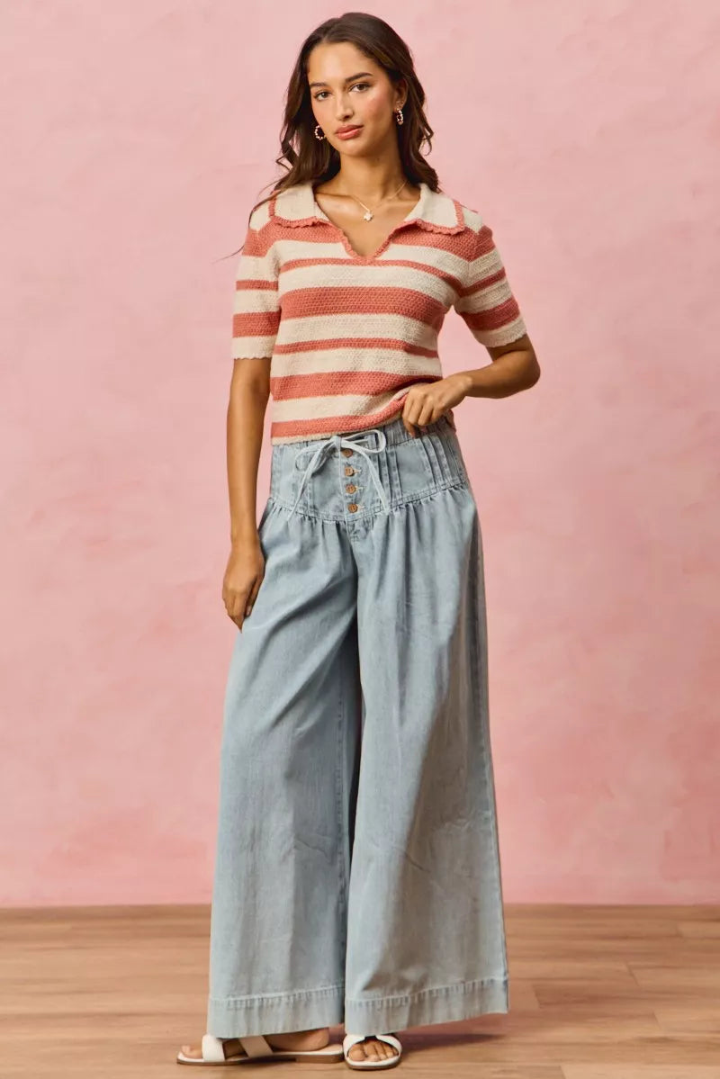 Model pairing Noreen Stripe Short Sleeve Cropped Sweater with jeans.