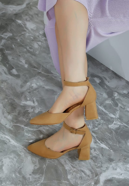 Woman wearing beige Rozita Block Heels highlighting smooth microfiber and flared block heel