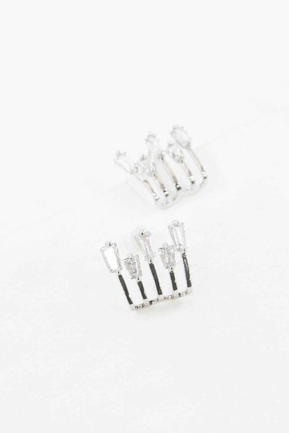 Close-up of Kalimba Silver Baguette Post Earrings with five sparkling baguette stones on sterling silver push-back posts.