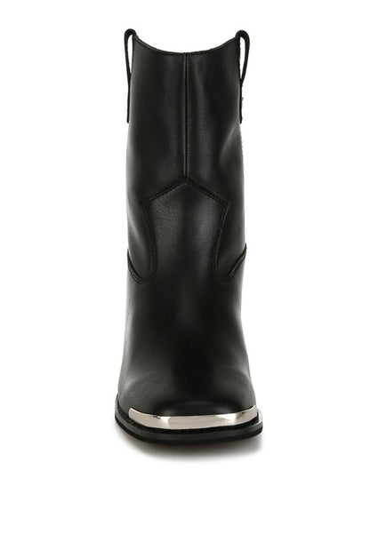 Iliad Leather Ankle Boots close-up front showing shiny metallic toe cap and curved paneling.