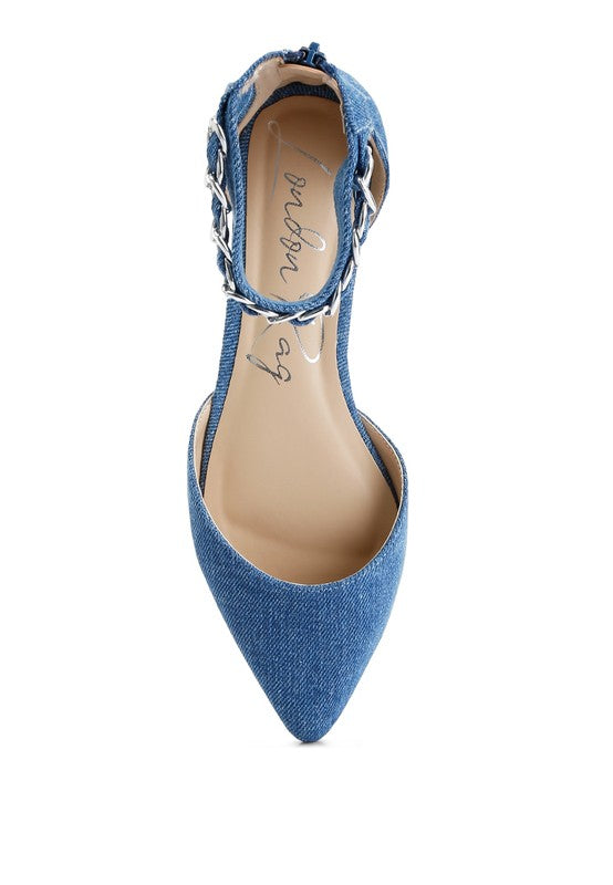 Denim flats with a pointed toe, chain ankle strap, and flat heel .