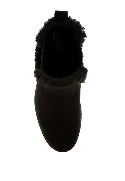 Top view of black Thunderhoof Boots with round toe and plush faux fur lining.