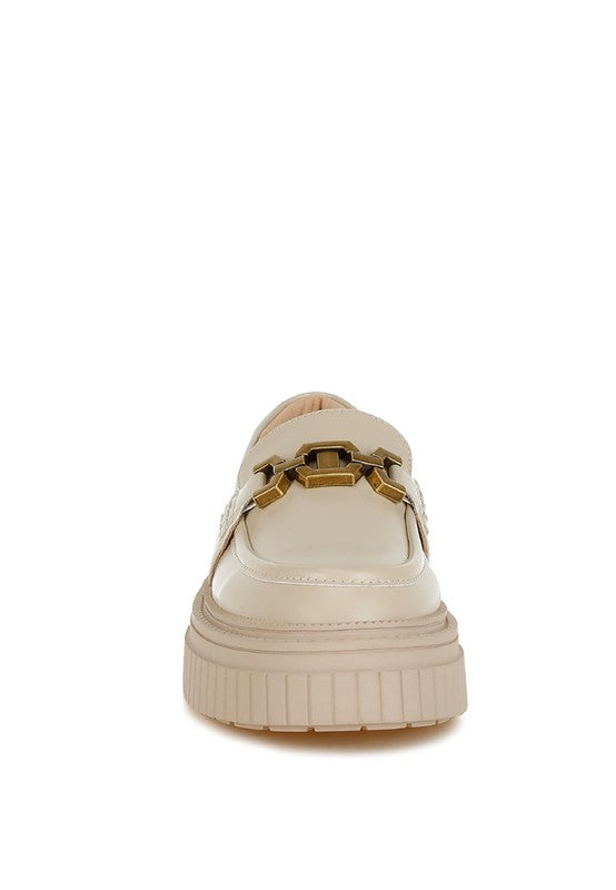 Front view of beige Grosbeak Chunky Loafers on white background.