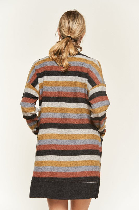 Back view of Vinni Stripe Cardigan showing multicolor rust, gold, gray, and beige stripes.