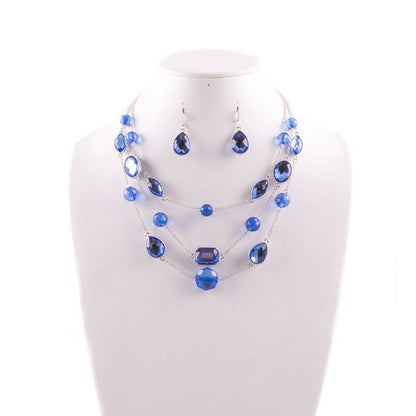Blue Gem Layered Necklace and Earrings Set in silver tone with triple-tier waterfall design and matching drop earrings on display.