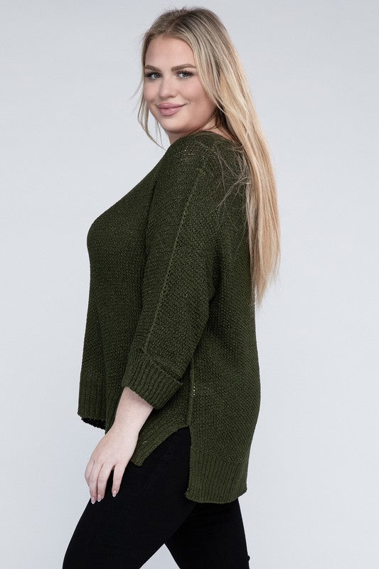 Olive green plus size crew neck sweater with a loose fit, long sleeves, and a cozy knit fabric for warmth.