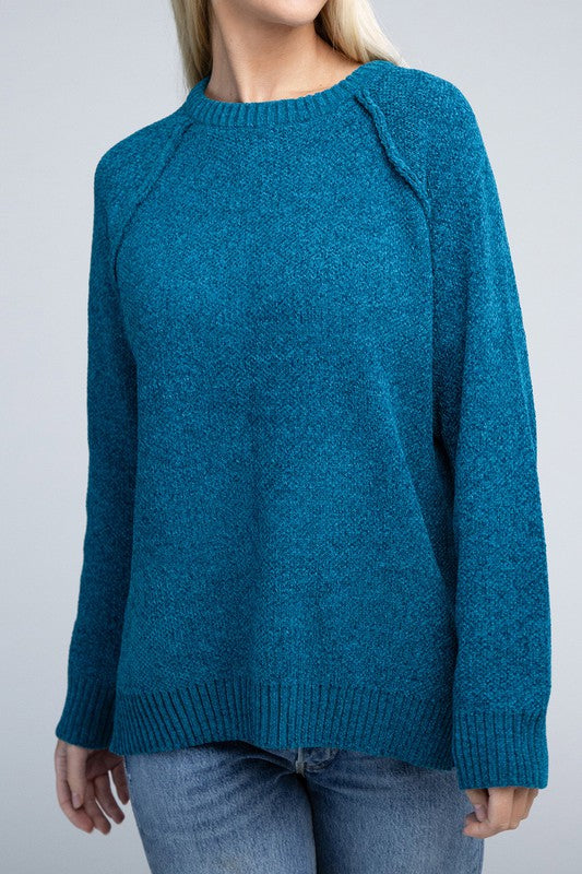 Ocean teal round neck chenille sweater with long raglan sleeves, relaxed fit, and hip-length cut.