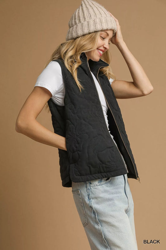 Noor Quilted Floral Vest in black with zipper and pockets, side angle