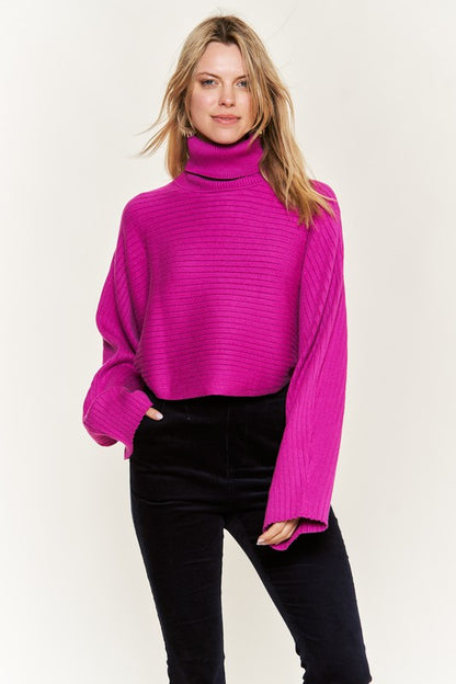 Front view Giada Mock Neck Wide Sleeves Sweater in fuchsia, ribbed knit design.