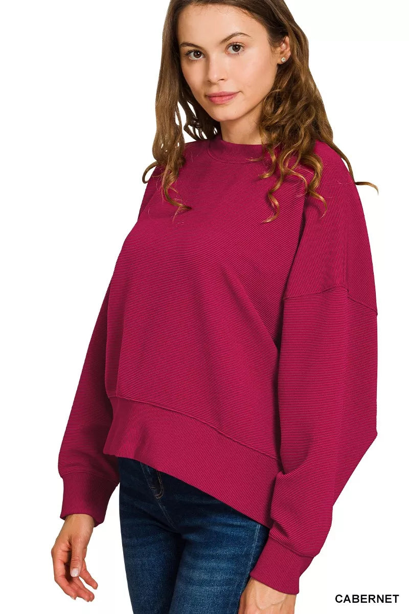 Side angle of Jenny Cabernet ribbed set, long sleeve pullover.
