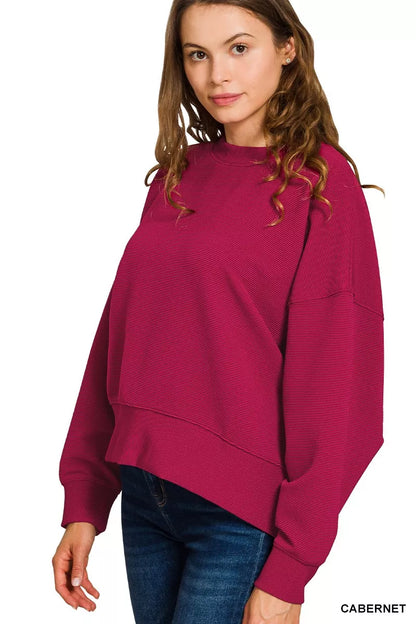 Side angle of Jenny Cabernet ribbed set, long sleeve pullover.