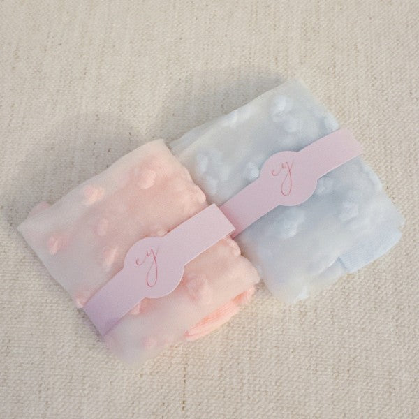 Folded pink and blue Sweet Hearts Sheer Socks side by side showing design.