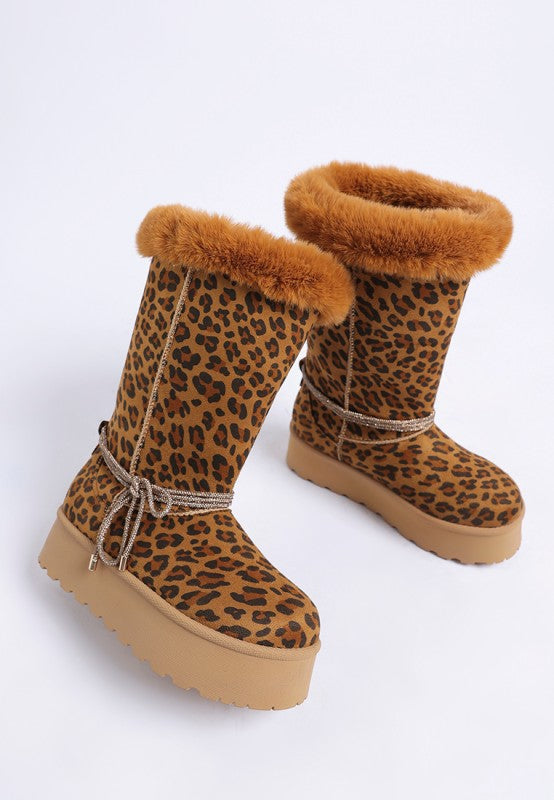 Pair of leopard Olonya Snow Boots front angle view with faux fur collar and platform heel.