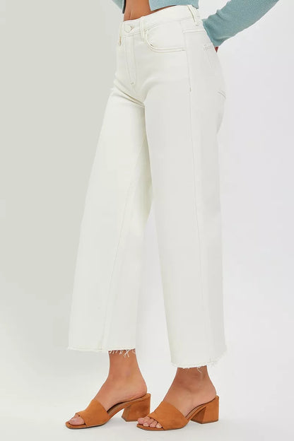 Side view of Joni Cream Tummy Control Wide Leg Crop Jeans, raw hem.