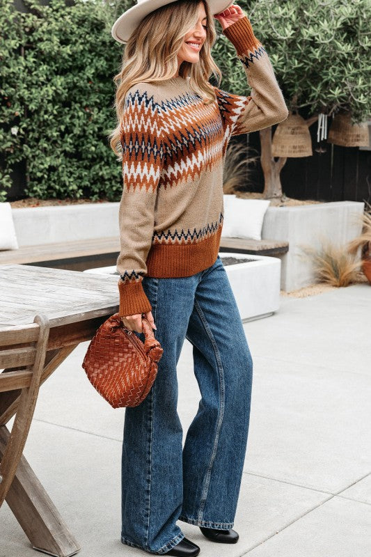 Side full body view of model wearing Eva Aztec Crew Neck Sweater.