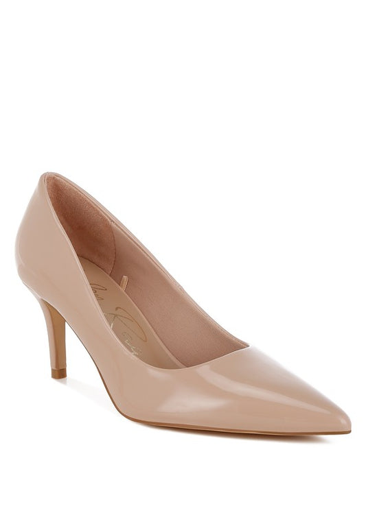 Blush patent leather stiletto heel pumps with a closed point toe. Features a 3-inch stiletto heel, cushioned insole, and made from patent faux leather.