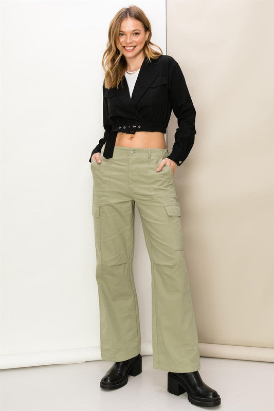 Sage high-waisted cargo pants with a straight-leg fit, functional side pockets, and zip fly.