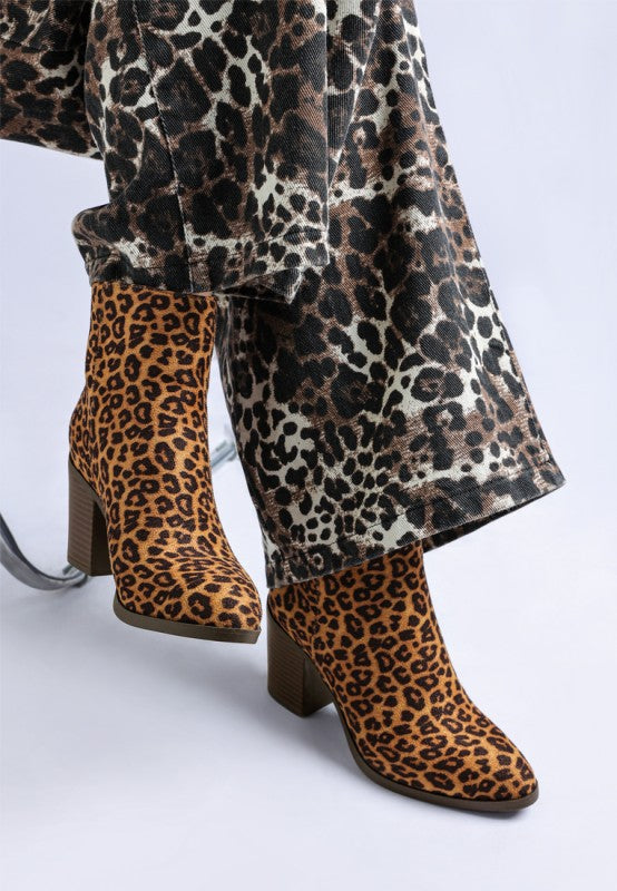 Front and  side view of Lunara Leopard Print Boots showing zipper fastening