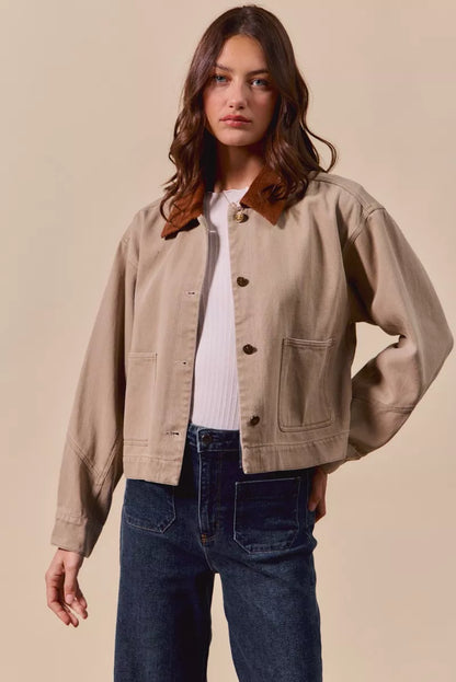 Model styling Suri Cotton Twill Cropped Barn Jacket with jeans and t-shirt for casual outfit.