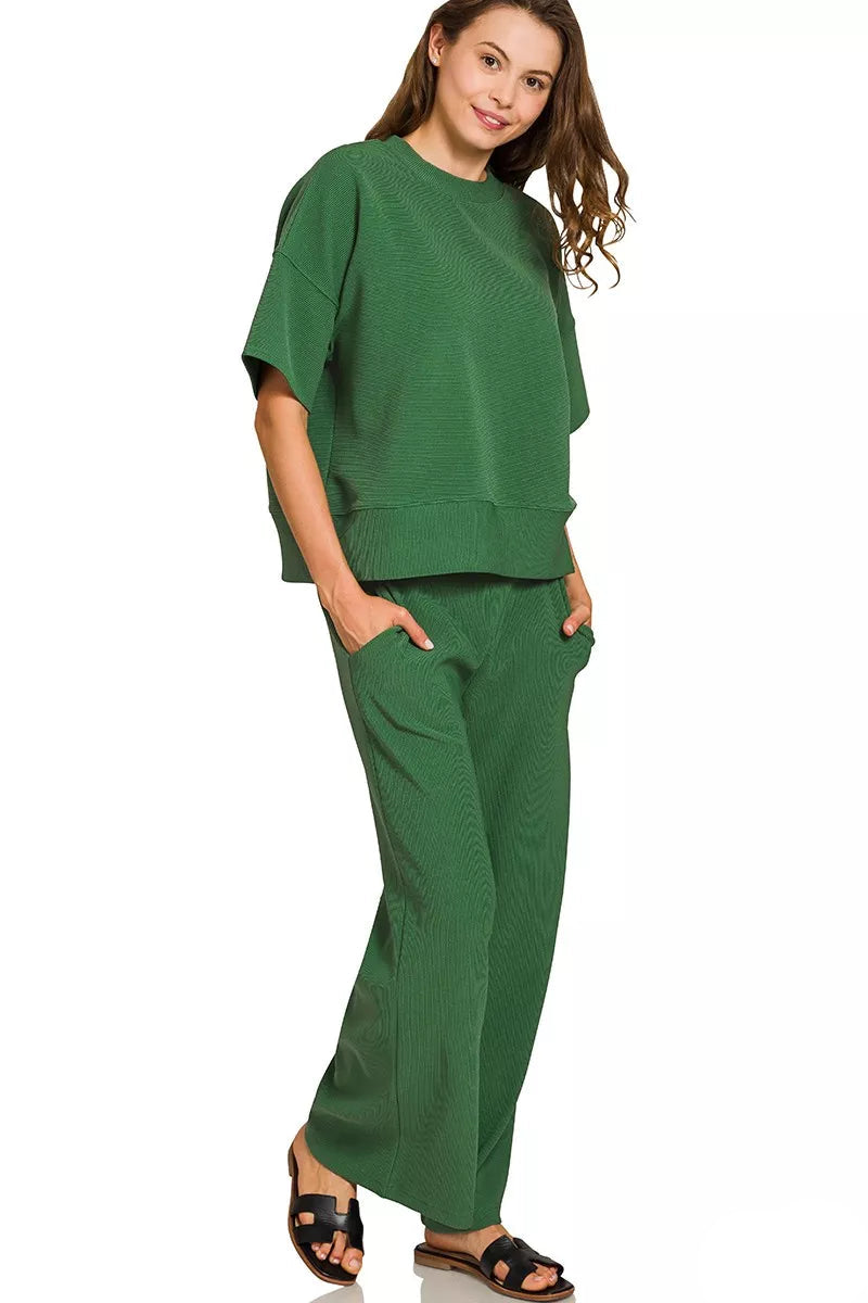 Model wearing Tori Ribbed Round Neck Tee & Pants Set Dark Green, ribbed short sleeve top and pants.