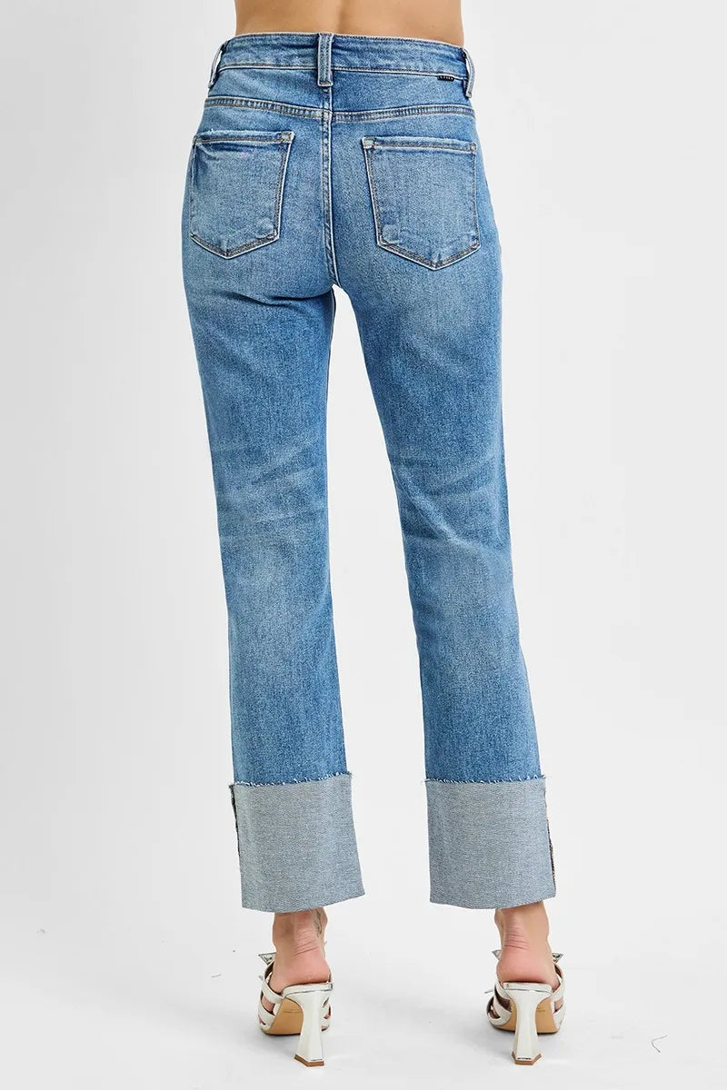Back view showing pocket design, ankle-length cuff, and flattering high-rise fit.