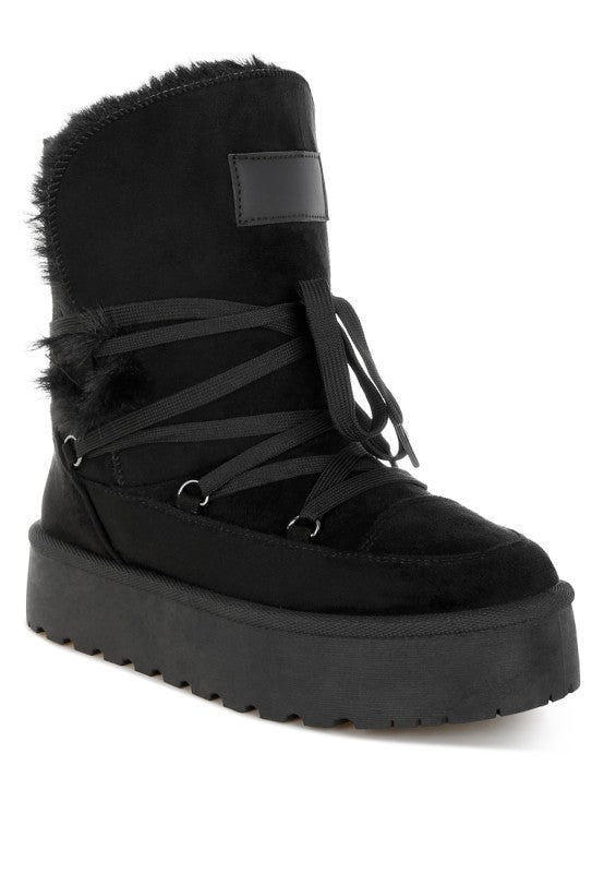 Noaya Chunky Faux Fur Snow Boots in Black with lace-up front and soft faux fur lining.