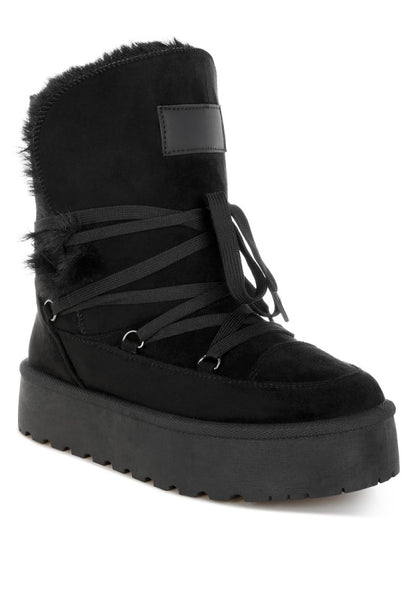 Noaya Chunky Faux Fur Snow Boots in Black with lace-up front and soft faux fur lining.