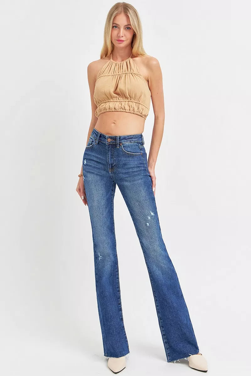 Full body view of Jax Flare Jeans styled with neutral heels