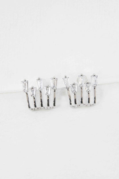 Close-up image of silver baguette stud earrings showcasing minimalist sparkle and modern design.