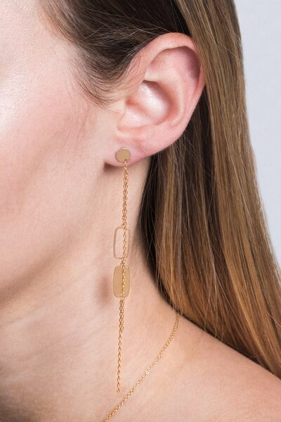 Geometric dangle earrings with sterling silver posts, 4-inch drop, and 0.25-inch width.