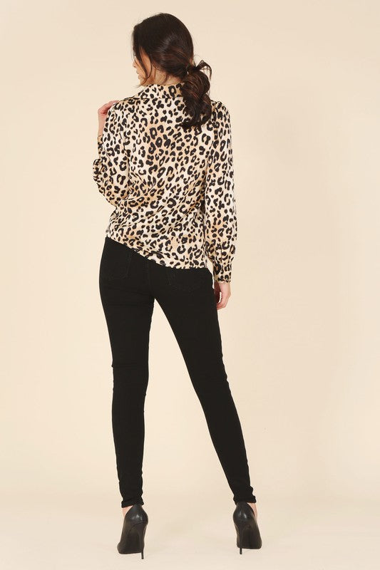 Leopard print satin blouse with a shirt collar, long sleeves, and button-down closure.