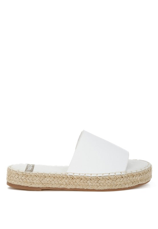 Side view of Scalar White Leather Flatforms with open round toe, soft leather upper, and 1-inch jute-wrapped platform heel.