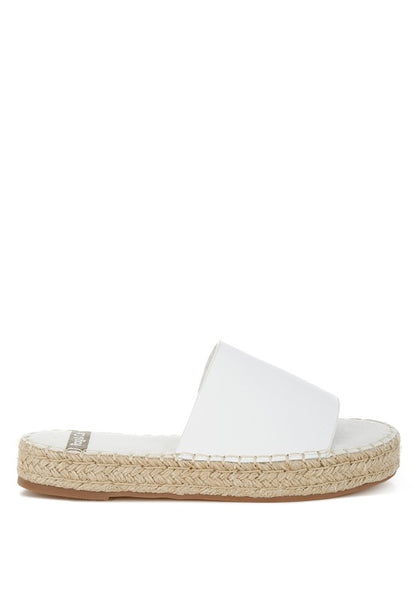 Side view of Scalar White Leather Flatforms with open round toe, soft leather upper, and 1-inch jute-wrapped platform heel.