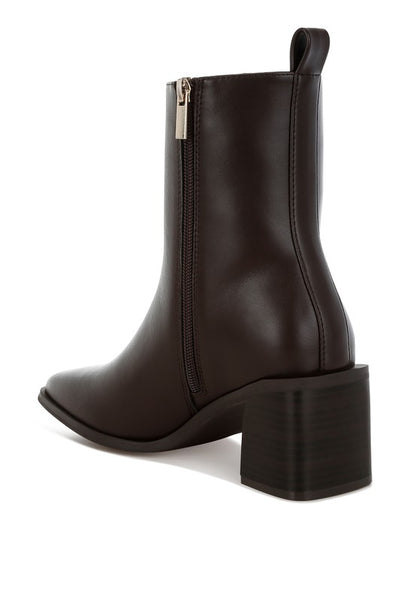 Back angle of Brown Muskox Square Toe Boots showing cushioned heel and vegan leather finish.