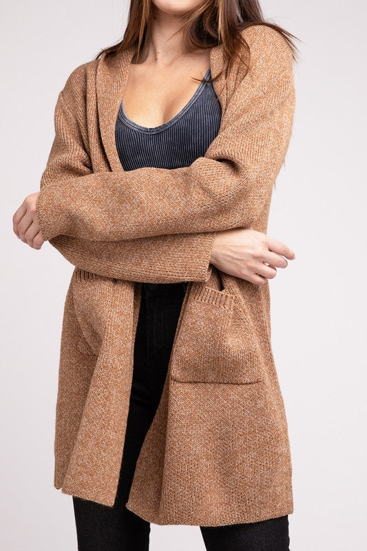 Deep camel sweater cardigan with long sleeves, front pockets, and a hooded neckline. 