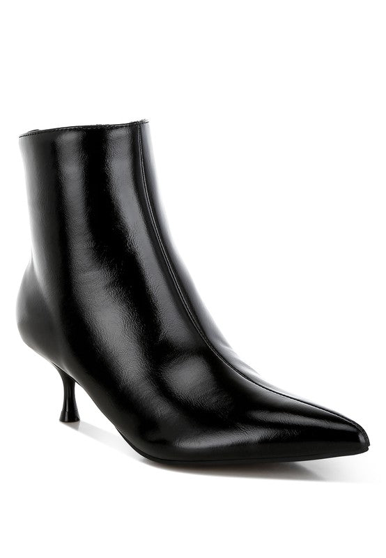 Black faux leather kitten heel boots with a closed point toe, 2.5-inch heel, and zipper fastening. Features paneling detail, elasticated gussets, and comfortable cushioned insoles.