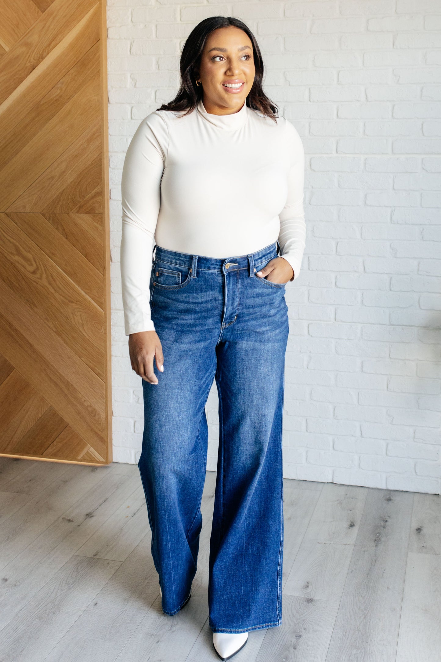 Judy Blue High Rise Control Top Retro Wide Leg Jeans in dark wash, featuring a zip fly, tummy control, and wide-leg silhouette. Plus size.