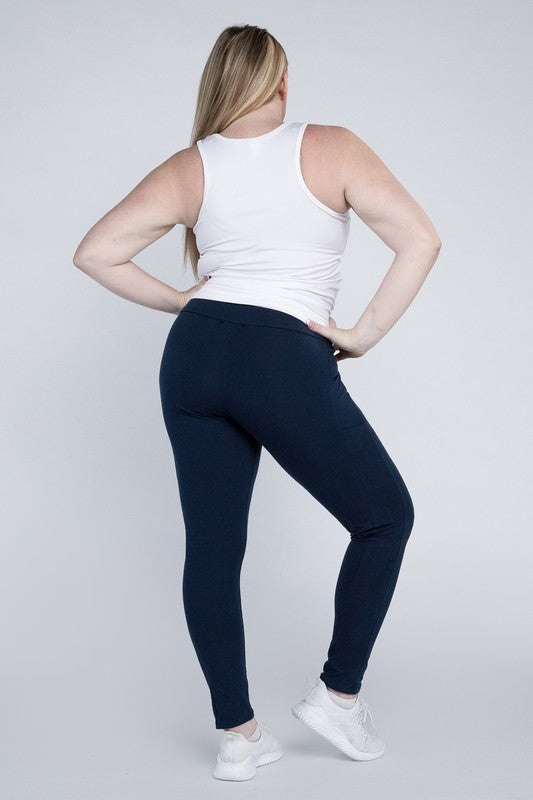 Full-length curvy plus leggings in eclipse blue with a high-rise thick waistband, fitted silhouette, and convenient leg pockets.