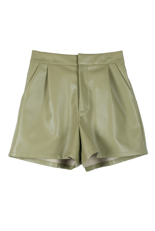 Trendy green vegan leather shorts featuring a hook and zipper closure, side pockets, pin-tuck detailing, and a comfortable wide elastic waistband.