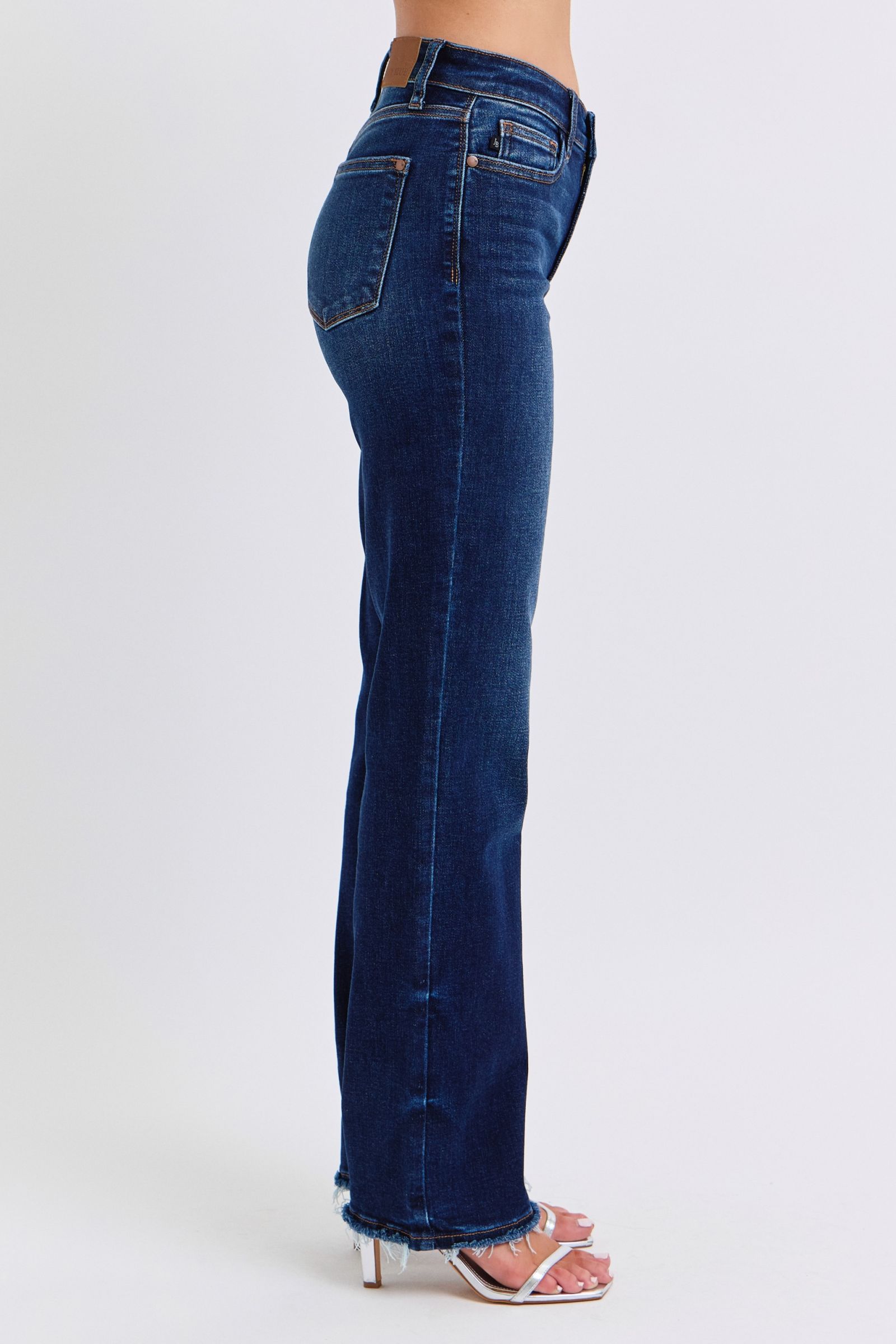 Judy Blue Polly Raw Hem Straight Leg Jeans in dark wash, featuring a mid-rise waist, raw hem, and slightly stretchy fit for a versatile, stylish look.