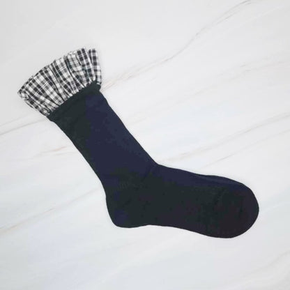 Black Oh So Chic Plaid Ruffle Sock with plaid ruffle top detail.